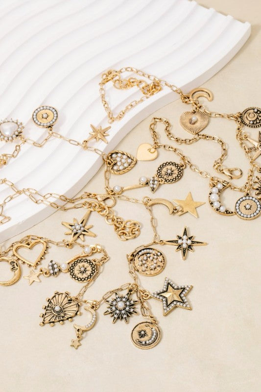 Studded Heart Moon Star And Coin Charms Statement Necklace